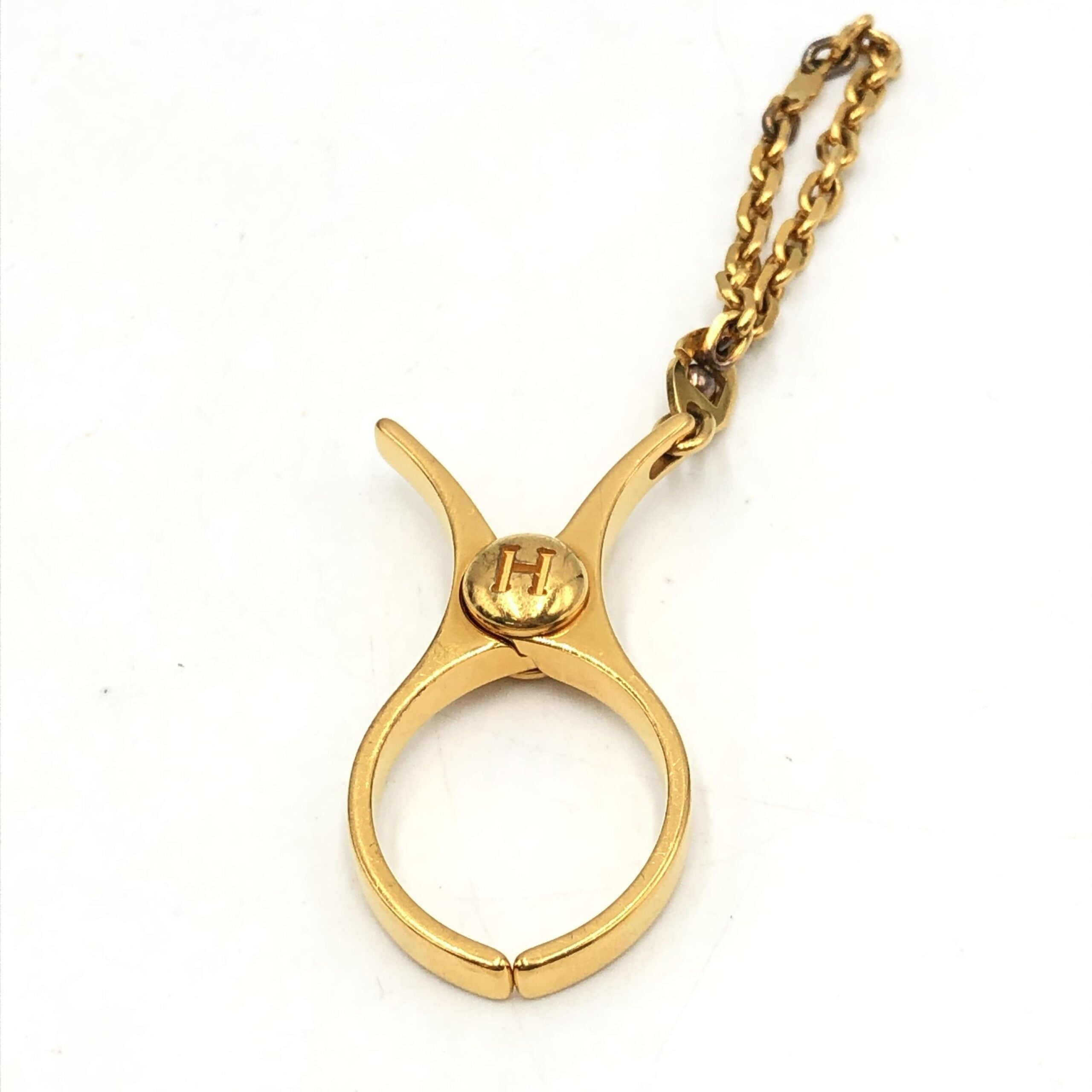 Hermès Gold Metal Glove Holder Keychain Hermès
