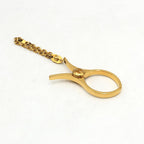 Hermès Gold Metal Glove Holder Keychain Hermès