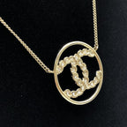 Chanel Gold Tone CC Circle Pendant Necklace Chanel