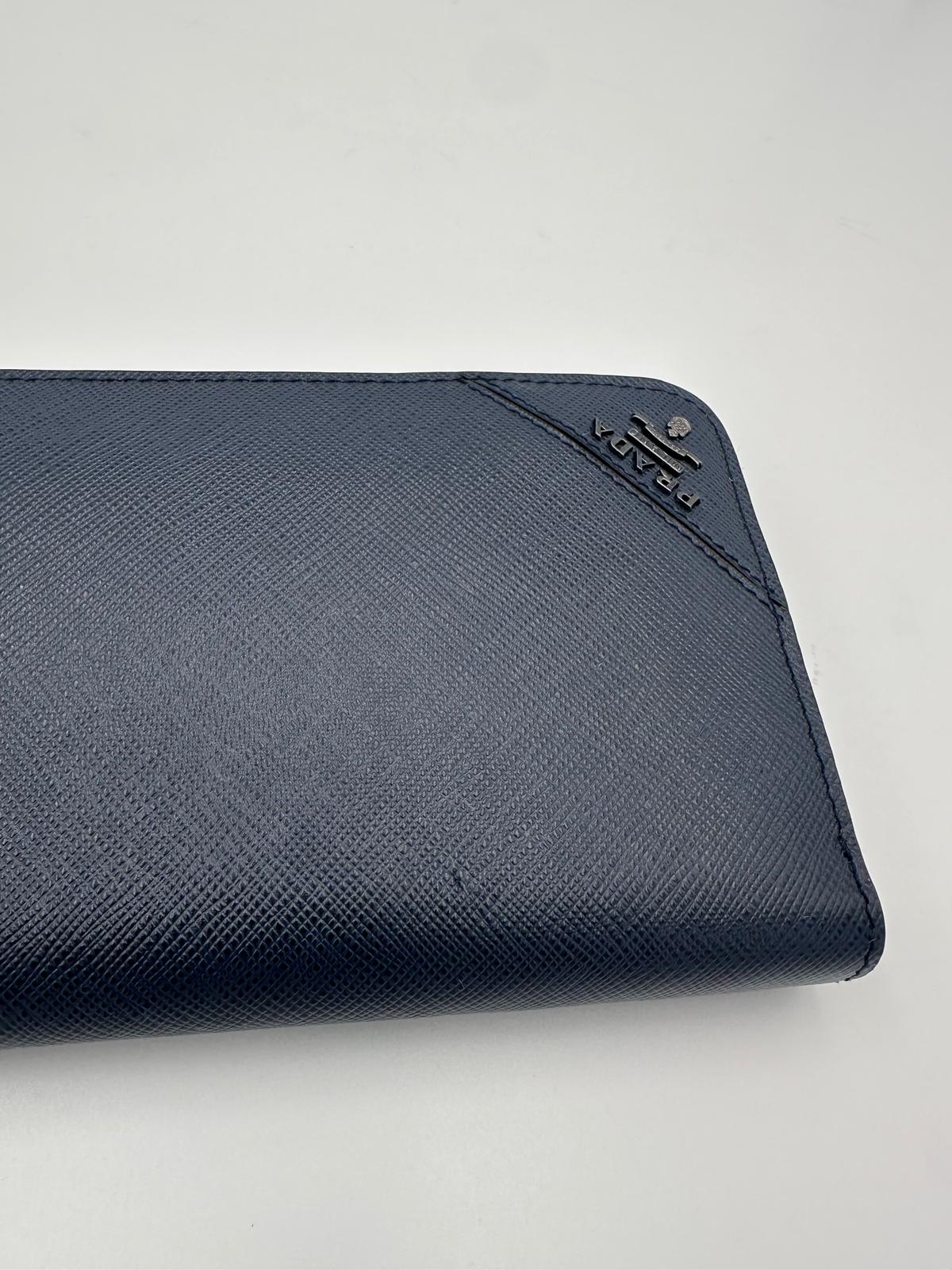 Prada PRADA Zip in Blue Saffiano Wallet Prada