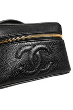 Chanel Black and gold makeup bag Chanel