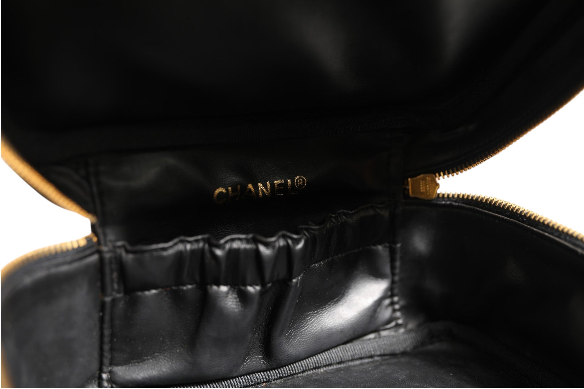 Chanel Black and gold makeup bag Chanel