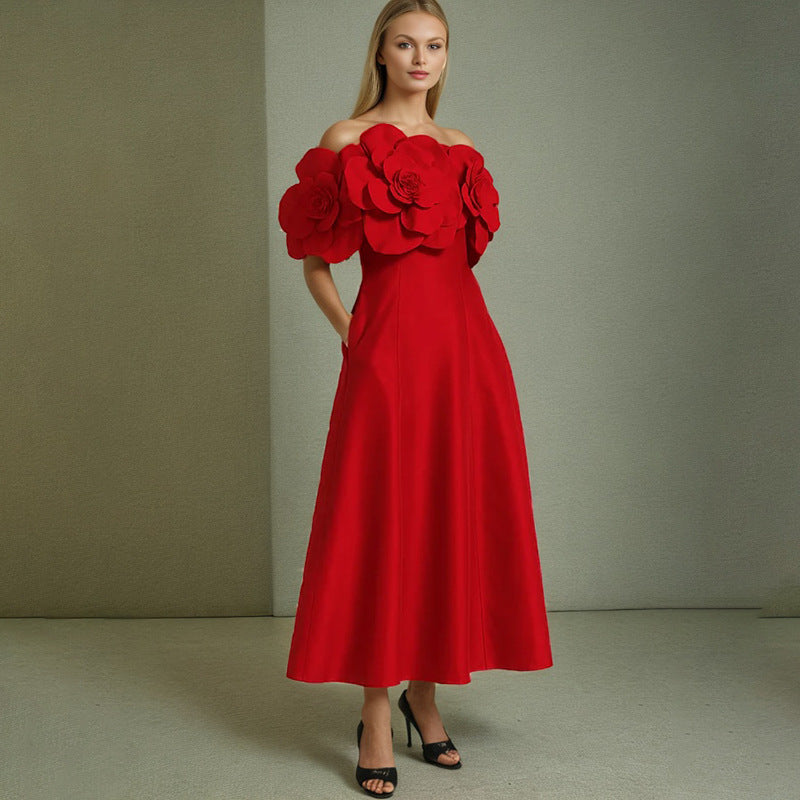 This French-inspired maxi dress features a striking one-shoulder design with floral patchwork and a fitted waist. eprolo
