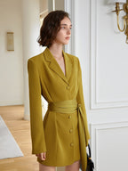 A striking yellow blazer dress with a cinched belt, lapel collar, and long sleeves. The loose fit offers comfort while the belt defines your shape. eprolo