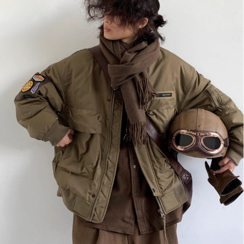 Embrace vintage-inspired style with this oversized pilot down jacket, designed for those who appreciate classic workwear aesthetics. LittleYogaSocks