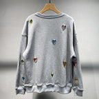 Small niche autumn and winter new grey round neck hollow out heart embroidered long sleeved hoodie for women eprolo