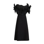 This French-inspired maxi dress features a striking one-shoulder design with floral patchwork and a fitted waist. eprolo