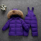 Premium white duck down jacket with detachable hood and 76-80% cashmere blend, designed for toddlers aged 1-3 years with soft-touch fabric and versatile solid or cartoon patterns. VELORIA - Thread of Generations