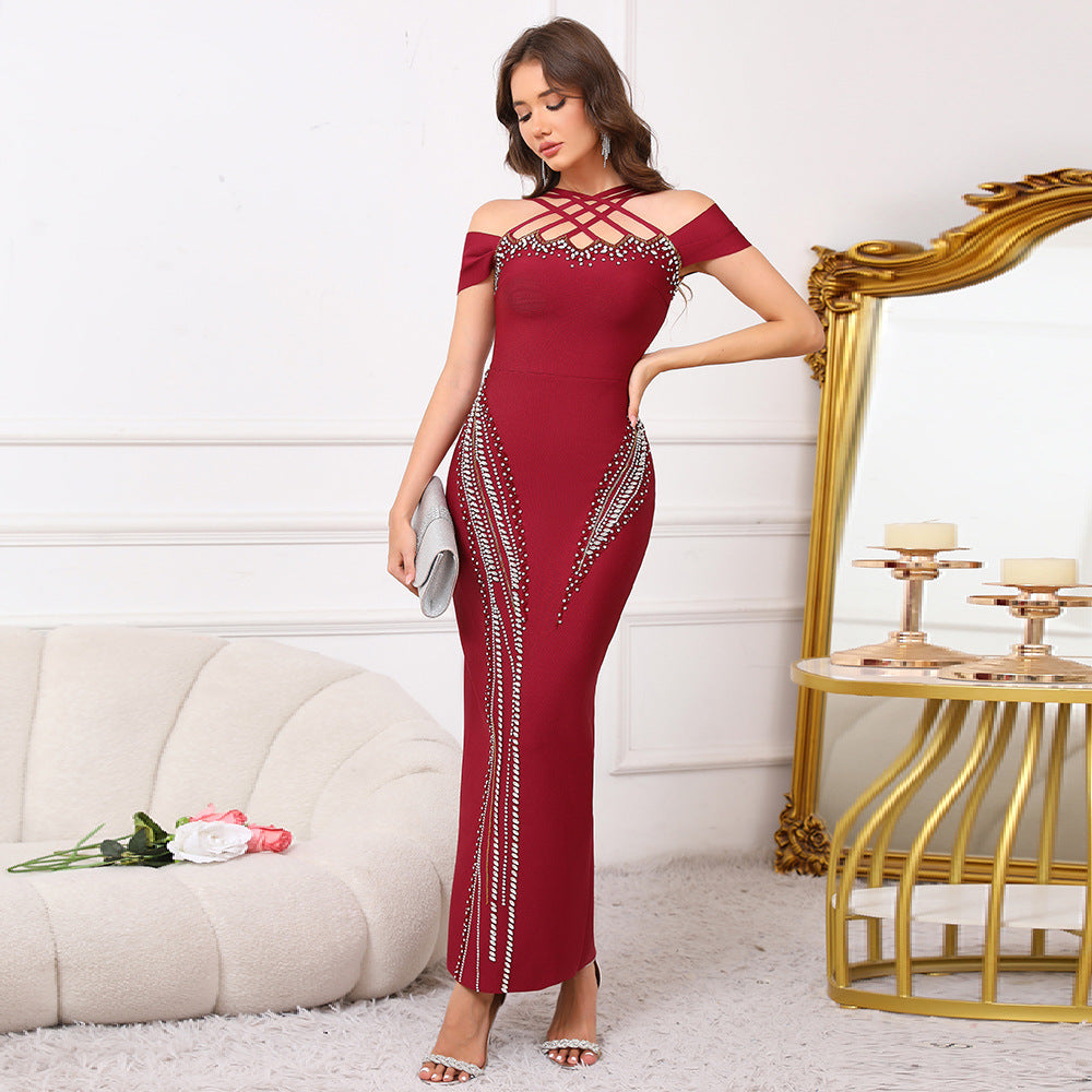 Elegant backless halter maxi dress with a fitted bodycon silhouette and beaded embellishments eprolo