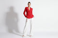 Red blazer on a mannequin against a white background