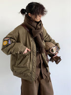Embrace vintage-inspired style with this oversized pilot down jacket, designed for those who appreciate classic workwear aesthetics. LittleYogaSocks